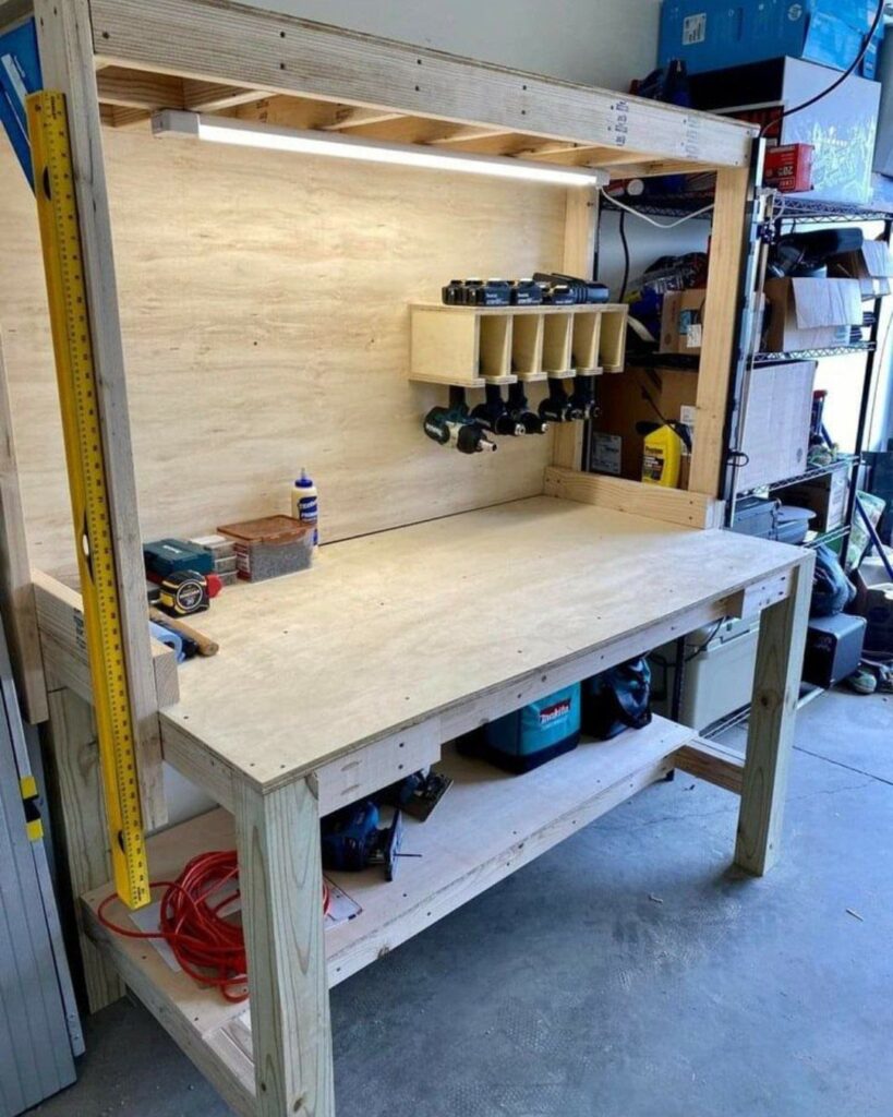 Wooden homemade workbench with a lower shelf and tool rack for power drills
